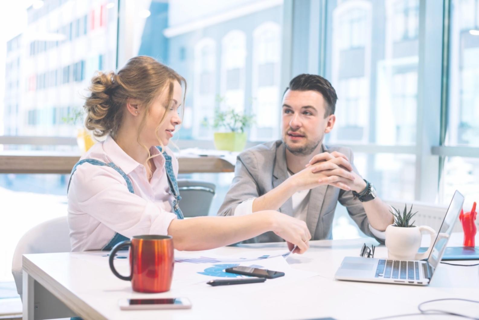 Students engaged in interactive finance learning session with instructor