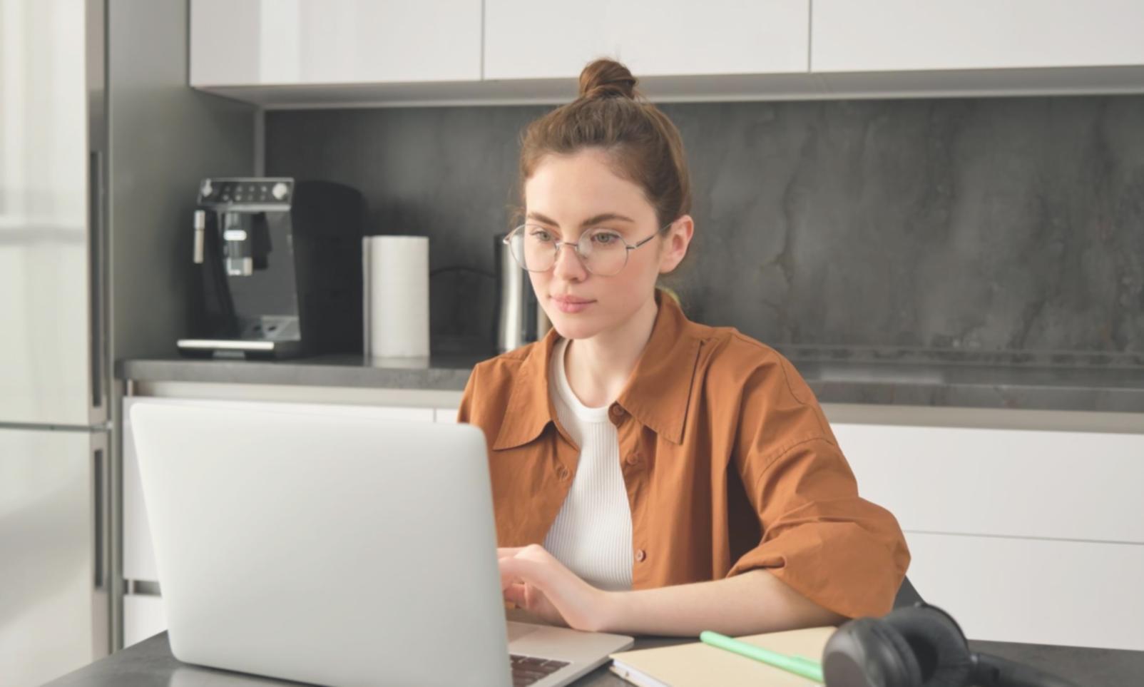 Students analyzing financial charts and investment data in a practical learning environment